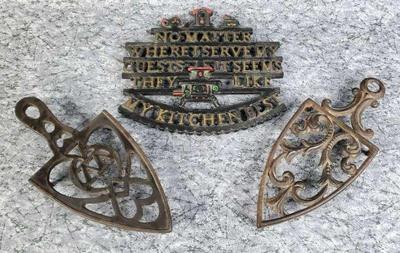 3 vintage cast iron trivets