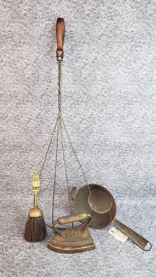 Antique home goods sad iron rug beater, colander