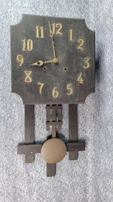 Antique wooden wind up wall clock