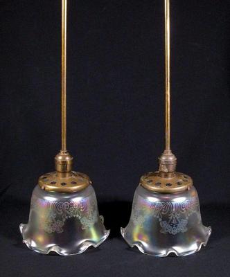 Superb pair of antique industrial fixtures with Art Nouveau shades