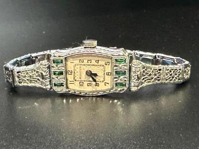 platinum, diamonds and emerald watch