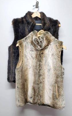 2 reversable faux fur vests