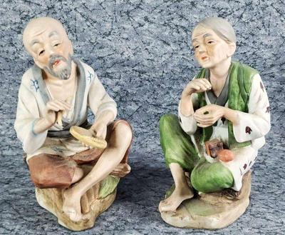 Vintage porcelain elderly asian man woman figurines