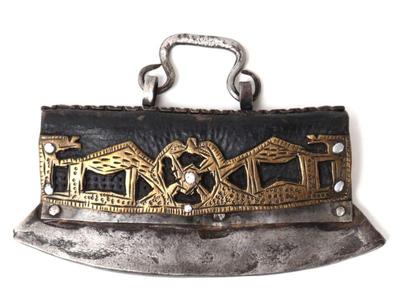 Lot 217 tibetan leather brass openwork chuckmuck (fire start), 19th c.
