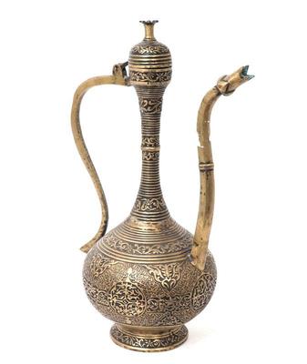Lot 208 indo persian brass elongated ewer