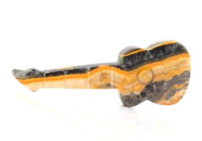 Lot 153 natural bumblebee jasper carved guitar