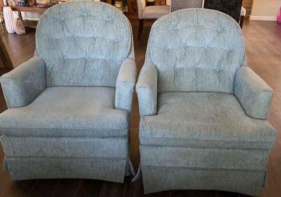 Light blue swivel rocking chairs