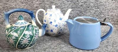 Teapots forlife with strainer single serve asian, and german