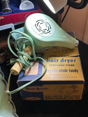 Vintage hair dryer includes original box and sack