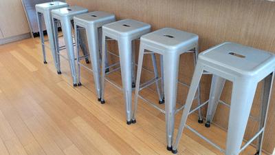 SIX METAL BAR STOOLS
