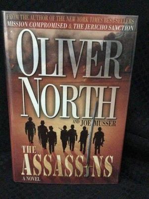 Signed first edition oliver north with joe musser the assassins' book