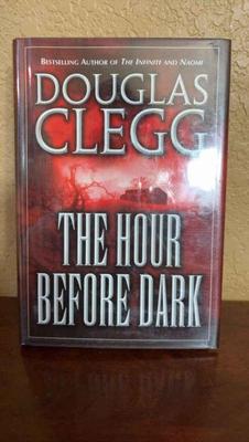 Signed first edition douglas clegg 'the hour before dark' book