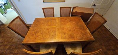 LARGE HENREDEN DINING ROOM TABLE WITH EIGHT CANED BACK AND CUSHIONED CHAIRS, ALSO TWO EXTRA LEAVES