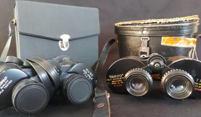 TWO PAIRS OF BINOCULARS WITH THEIR CASES