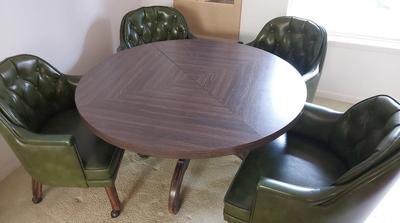 SLEEK GREEN CUSHIONED DINING ROOM CHAIRS AND WOOD TABLE