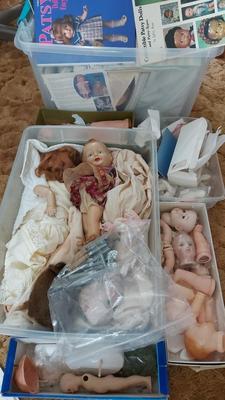 LARGE MYSTERY LOT OF DOLL PARTS AND COLLECTOR BOOKS
