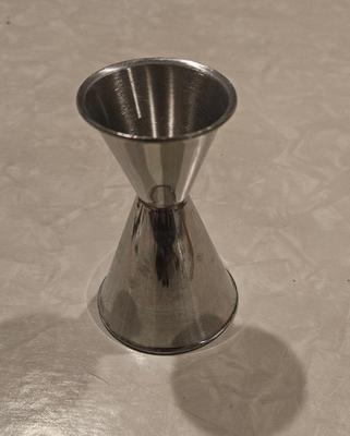 Glass 1950s metal shot glass