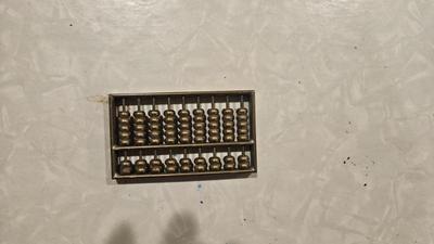 Vintage brass abacus