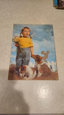 Circa 1940s 1950s louis f dow litho puzzle girl flowers dog