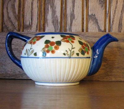 Sale Photo Thumbnail #922: Ceramics early 1900s blue spout tea pot no lid
