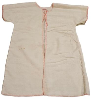1960s baby s robe with red trim on edges