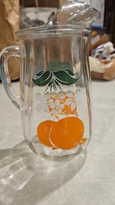 Glass 1950s orange juice pitcher