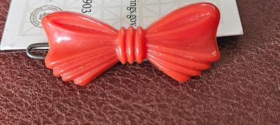 Toiletries barrettes 1950s small red
