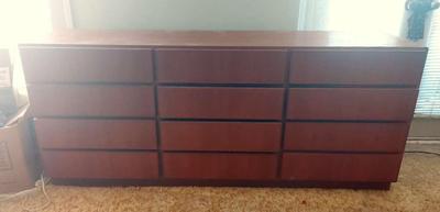 TWELVE DRAWER WOODEN DRESSER