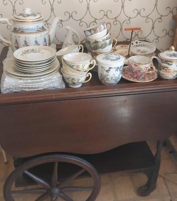 SELECTION OF STUNNING CHINA ON WOODEN TEA CART 