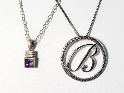 2 sterling necklaces and pendants