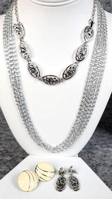 2 necklaces and 2 pair of earrings