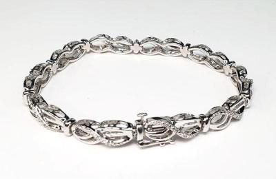 Sterling bracelet sun s s. diamond chip illusion tennis bracelet
