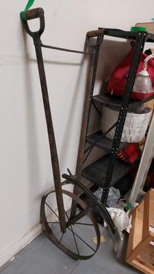 ANTIQUE STEEL WHEELED PUSH PLOW