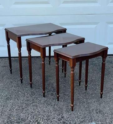 Set of wooden nesting tables with reeded legs