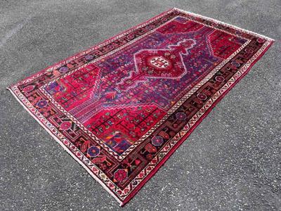 Red and purple area rug