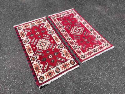 2 red rug runners