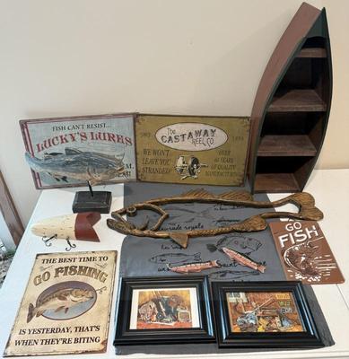 Large Lot Fishing Decor- Wooden Fish, Lure, Metal Signs, Framed Photos, Wooden Canoe Shelf & More
Lot #: 271