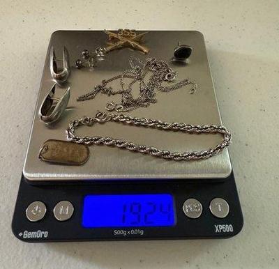 925 Silver Misc Lot- Bracelet, Chains, "Oma" Pendant, Military Pin & More- 19.24 Grams
Lot #: 24