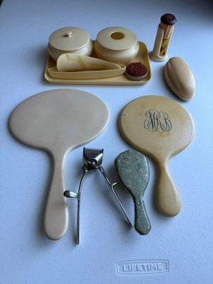 Lot Of Vintage Celluloid Beauty Items
Lot #: 40
