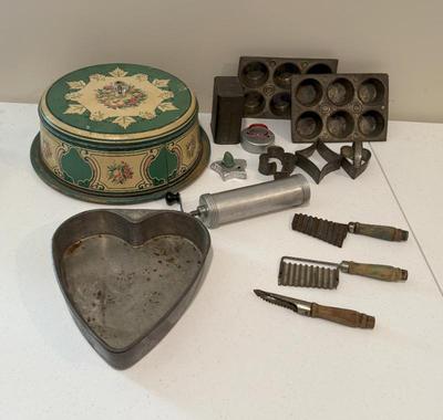 Vintage Kitchenwares Lot- Metal Covered Cake, Cake Decorator, Muffin Pans, Breakfast Cocoa Tin, Cookie Cutters
Lot #: 221