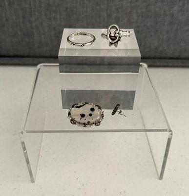 Lot Sterling Silver- Vintage Brooch W/stone, Avon Key Ring, Rope Pattern Ring, Single Earring- 11.79 Grams
Lot #: 25