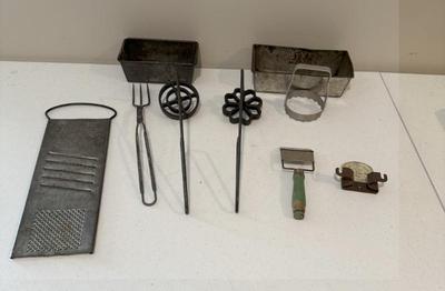 Vintage Kitchenwares Lot- Farmer's Cream Station NE Advertising, Rosette Makers, Grater, Loaf Pans & More
Lot #: 220