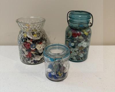 Lot Vintage Ball Jar W/ Buttons, Candy Jar W/buttons And Canister Jar W Marbles
Lot #: 281