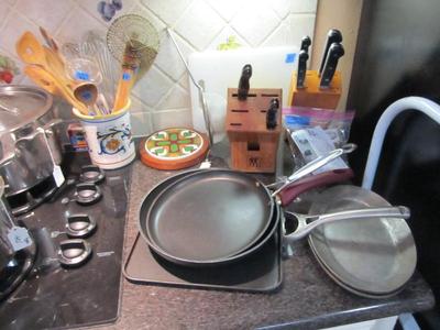 Sale Photo Thumbnail #100: Full kitchen - small appliances, glassware, gadgets, utensils, cast iron, pots and pans sets, cookbooks, and more