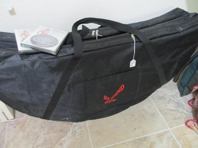 Sale Photo Thumbnail #145: Rebound folding exercise trampolines in their storage bags. (2 available)