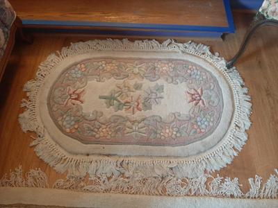 Nice oval fringe throw rug