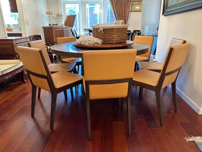 Eight leather dining chairs