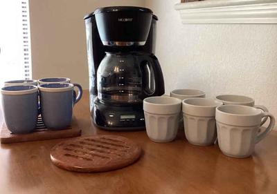 Mr coffee and 9 cups 2 wood trivets