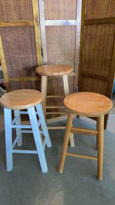 Three wooden stools