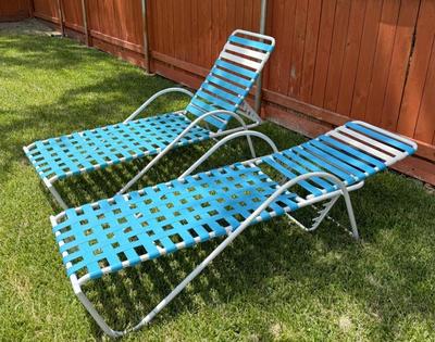 Two blue and white reclining patio chairs reserve $75)1